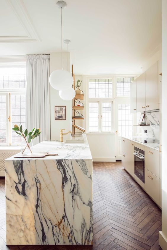 Stunning marble island in white kitchen