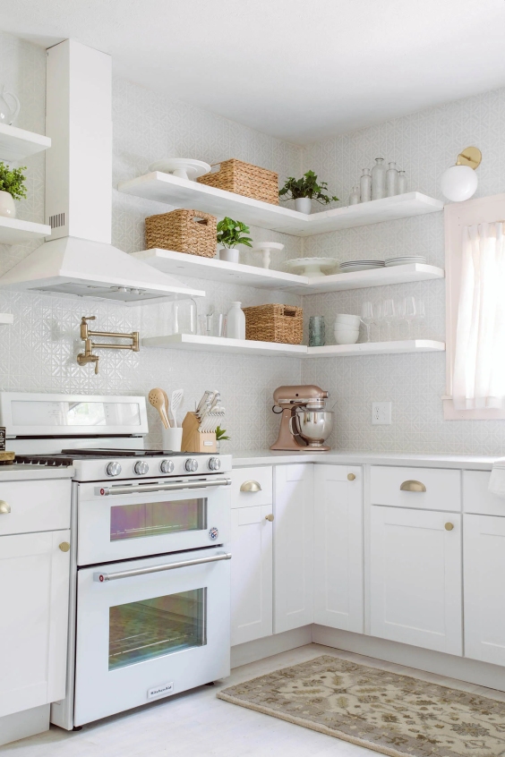 White kitchen with light pink mixer