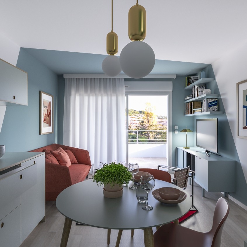 blue wall paint separating dining area from living area in a small flat