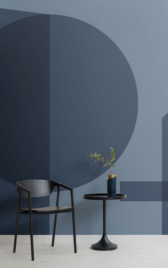 dark grey wallpaper with geometric patterns on it