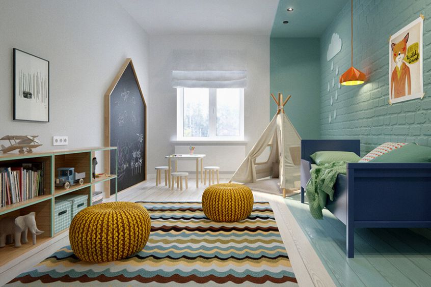 boy bedroom with bricks painted in blue colour and geometric colourful rug, dark blue bed and yellow puffs